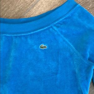 Retro Lacoste sweatshirt.